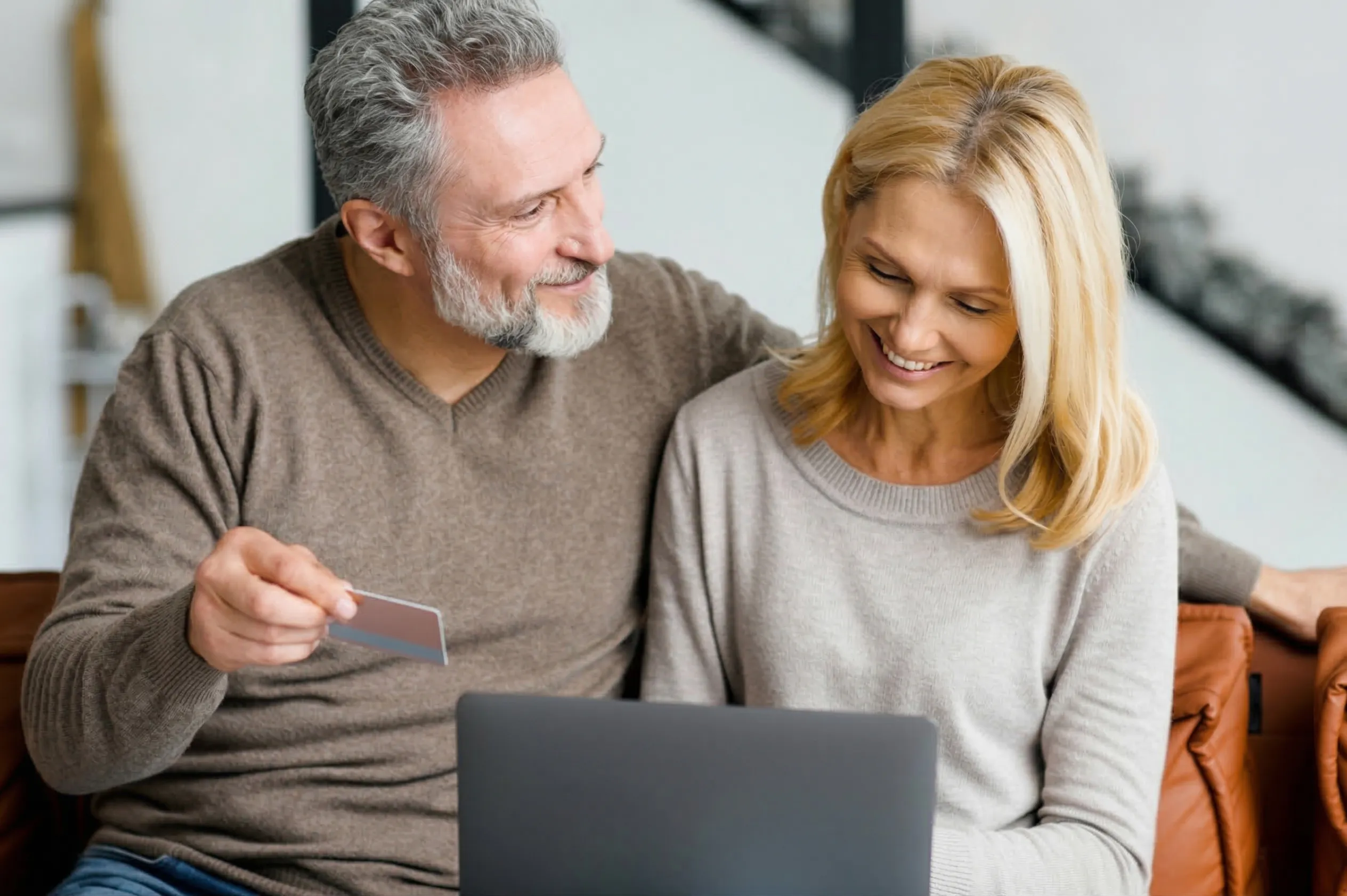 Couple reviewing GIC rates together